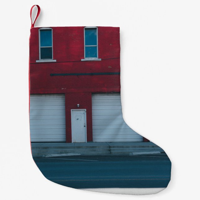 WHITE GARAGE DOORS CLOSED DURING DAYTIME SMALL CHRISTMAS STOCKING (Front)