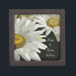 White Garden Daisies Wedding Gift Box<br><div class="desc">Customize the pretty White Garden Daisies Wedding Gift Box with the personal names of the bride and groom and specific marriage ceremony date. This elegant little box is also perfect for the ring bearer to carry the wedding rings in down the aisle at the wedding ceremony. This beautiful botanical wedding...</div>