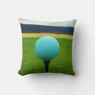 white Golf Ball on a mountain golf course Throw Pillow