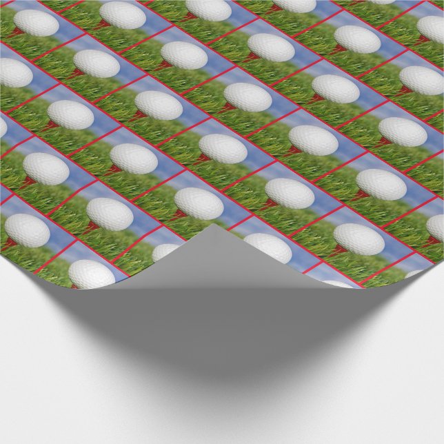 white golf ball on red tee wrapping paper (Corner)