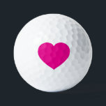 White Golf Ball with Pink Heart – Romantic Sports<br><div class="desc">Add a touch of love to your game with this custom white golf ball featuring a bold pink heart printed at the center. Whether you're gifting it to a golf enthusiast or using it for a special occasion, this ball blends sporty function with heartfelt style. Designed for performance with a...</div>