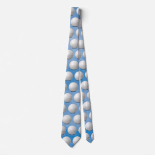 white golf balls on sky background tie