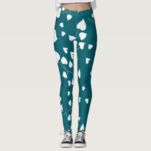 White heart leaf pattern on teal green leggings