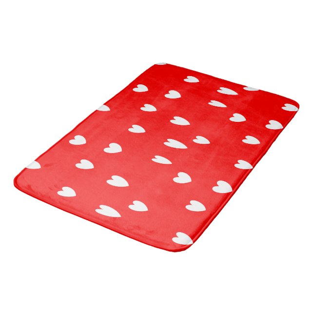 White hearts pattern on red bath mat (Angled)