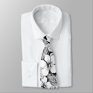 White hibiscus and palm leaves tie