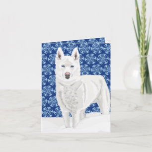White Husky against Snow Flakes and dark blue sky  Card