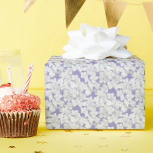 White Hydrangea Flower Petals On Purple Wrapping Paper