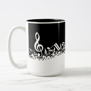 White Jumbled Musical Notes on Black Two-Tone Coffee Mug