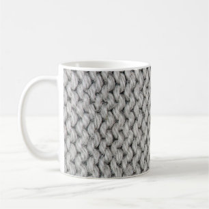 White knitted wool texture, close-up photo. coffee mug