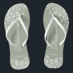 White Lace on Sage Green Bridesmaid Wedding Flip Flops<br><div class="desc">These beautiful wedding flip flops are a great way to thank and recognize your bridesmaids while saving their feet at the same time. Features an elegant design with white floral lace filigree on a dusty purple, lilac, or lavender coloured background. The elegant script lettering reads Bridesmaid with her name below....</div>