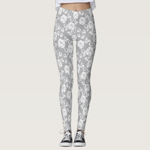 White lace pattern on grey background leggings