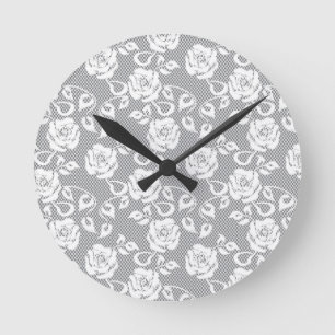 White lace pattern on grey background round clock