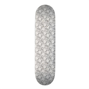 White lace pattern on grey background skateboard
