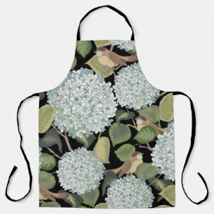 White, light blue Hortensia with green leaves and Apron
