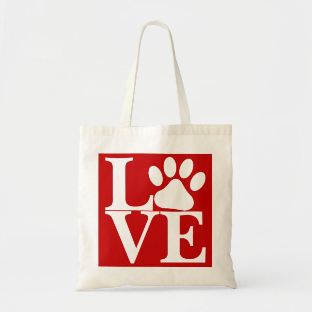 White LOVE Word Dog Paws Pattern On Red Background Tote Bag (Front)