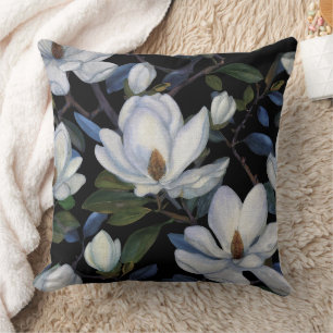 White magnolias on black pattern throw pillow