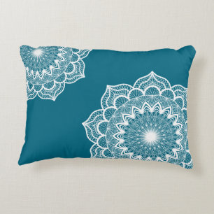 White mandala on blue background accent pillow