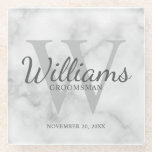 White Marble Classic Script Personalized Groomsmen Glass Coaster<br><div class="desc">Add a personal touch to your wedding with personalized groomsmen glass coaster. This coaster features personalized groomsman's name in grey classic script font style with wedding details in grey classic serif font style and monogram in light grey classic serif font style as background, on white marble background. Also perfect for...</div>