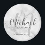 White Marble Modern Script Personalized Groomsmen Magnet<br><div class="desc">Add a personal touch to your wedding with personalized groomsmen magnet. This magnet features personalized groomsmen's name in grey modern script font style and monogram in light grey modern script font style as background with title and wedding date in grey modern sans serif font style on white marble background. Also...</div>