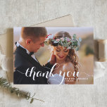 White Modern Calligraphy Photo Wedding Thank You Card<br><div class="desc">Express your heartfelt gratitude with our stunning customizable photo wedding thank you card, designed with elegant modern calligraphy. This card offers a sophisticated and stylish way to thank your guests for sharing in your special day. The card includes a designated space for a cherished photo from your wedding, allowing you...</div>