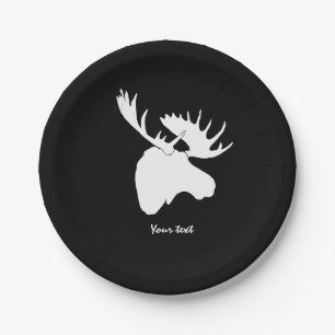 white moose against black background paper plate