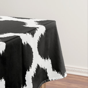 White Moroccan Geometric Pattern On Black Tablecloth