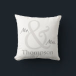 White Mr. and Mrs. Couple's Throw Pillow<br><div class="desc">For the Mr. and Mrs., this Couple's pillow features an oversized ampersand with the couple's last name that you can personalize with your name. Shown here in white with matching grey and white stripes on the reverse side. You can change the stripes colour on by choosing the "customize it" button...</div>