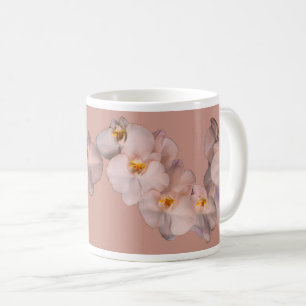 White orchids flowers on badge coffee mug