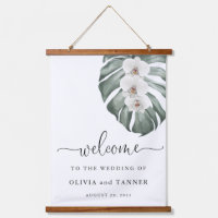 White Orchids on Monstera Tropical Wedding Welcome