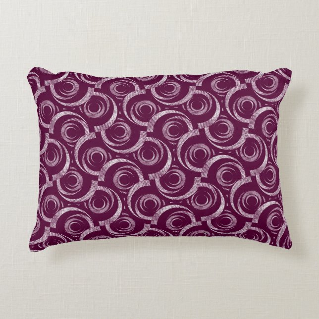 White ornament on a burgundy background. accent pillow (Front)