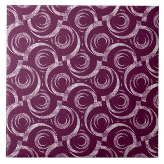 White ornament on a burgundy background. tile
