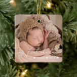 White Overlay Script Baby's First Christmas Photo Ceramic Ornament<br><div class="desc">Double-sided baby's first Christmas ornament to which you can add two photos of your baby,  one on each side. My first Christmas is written across in a delicate white script. Add your baby's name and the year!</div>