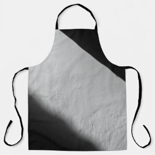 WHITE PAINTED WALL WITH BLACK TEXTILE APRON