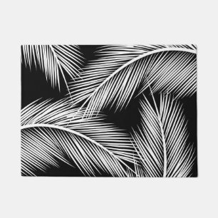 White palm leaves on black colour background doormat