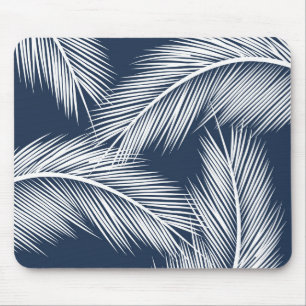 White palm leaves on dark blue colour background mouse pad