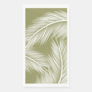 White palm leaves on green colour background napkin