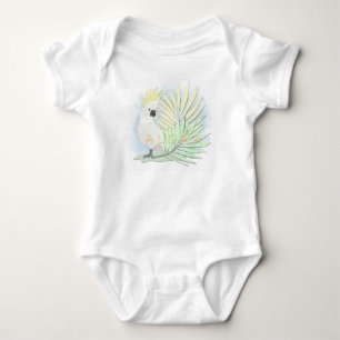 White parrot cockatoo in palm leaves. baby bodysuit