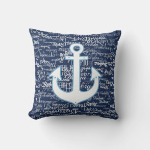 white pattern of names & boat anchor, on blue throw pillow
