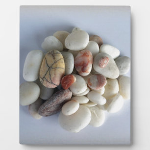 white pebbles plaque