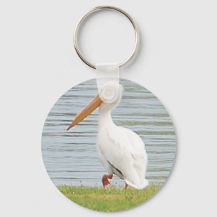 white pelican along shoreline keychain
