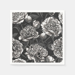 White peony flowers on dark grey napkin