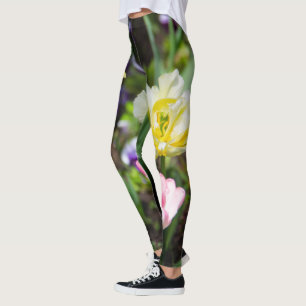 White, pink and yellow tulips in the garden   leggings