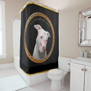 White pitbull with red kisses all over his face.