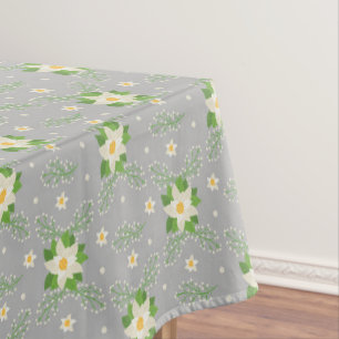 White Poinsettias Green Leaves Christmas on Grey Tablecloth