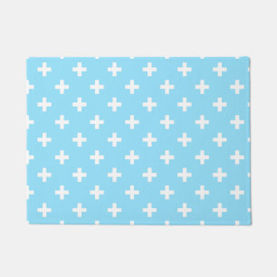 White polka crosses on baby blue doormat