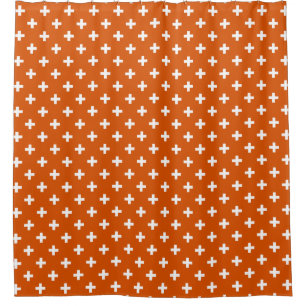 White polka crosses on burnt orange