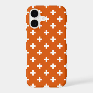 White polka crosses on burnt orange