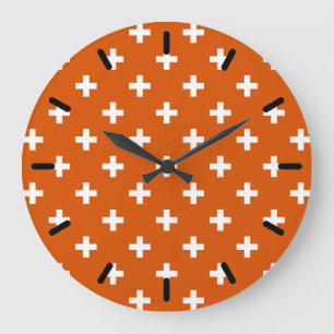 White polka crosses on burnt orange large clock