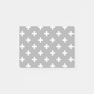White polka crosses on grey post-it notes
