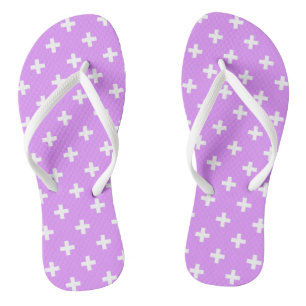 White polka crosses on lilac flip flops